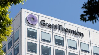 Irvine, CA, USA - May 6, 2022: Grant Thornton logo is seen at the company's office in Irvine, California. Grant Thornton LLP is a global independent accounting and advisory organization.