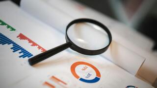 Magnifying glass and financials.jpg