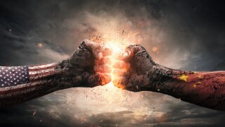 Conflict, close up of two fists hitting each other over dramatic