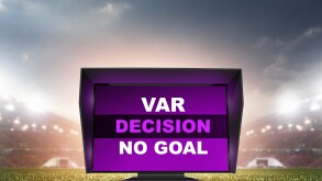 technology var decision no goal.The video assistant referee scene a match official in football stadium. 