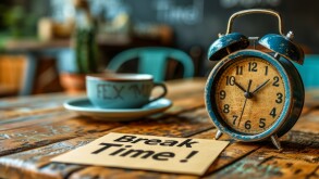 Alarm clock and sticky note with Break Time! text signifying the importance of taking a pause for rest and relaxation in daily routines