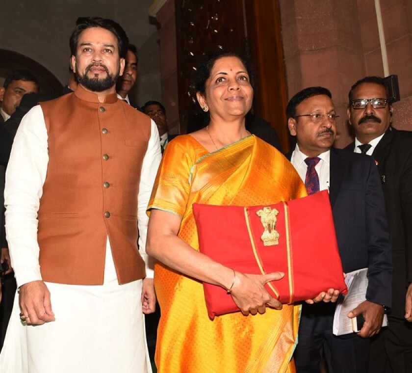 Finance Minister Nirmala Sitharaman with  the Minister of State for Finance and Corporate Affairs Anurag Singh Thakur arriving at Parliament House to present the budget