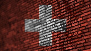 Switzerland flag  is depicted on the screen with the program code. The concept of modern technology and site development