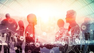 Creative image of many business people conference group meeting on city office building background showing partnership success of business deal. Concept of teamwork, trust and agreement.