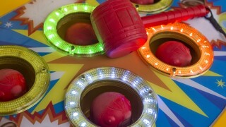 A game of moles in a park.