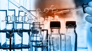 Laboratory glassware containing chemical liquid, science research,Double exposure of scientist and test tubes, laboratory concept.with chemical equations