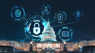 Front view, Capitol dome building at night, Washington DC, USA. Illuminated Home of Congress and Capitol Hill. The concept of cyber security to protect confidential information, padlock hologram