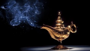 Magic Aladdin's Genie lamp on black with smoke