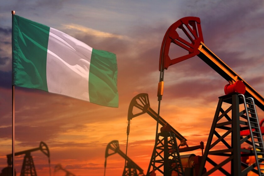 Nigeria oil industry concept. Industrial illustration - Nigeria flag and oil wells with the red and blue sunset or sunrise sky background - 3D illustration