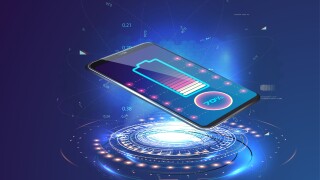 Wireless charging of the smartphone battery. Future concept. The progress of charging the battery of the phone.Wireless charging technology concept on blue background.