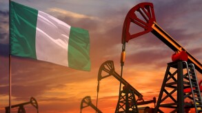 Nigeria oil industry concept. Industrial illustration - Nigeria flag and oil wells with the red and blue sunset or sunrise sky background - 3D illustration