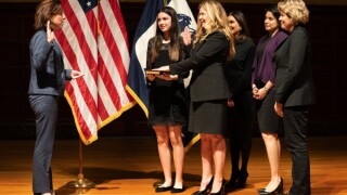 Kathi Vidal being ceremonially sworn in by commerce secretary Gina Raimondo