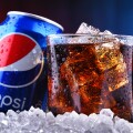 A can and a glass of Pepsi