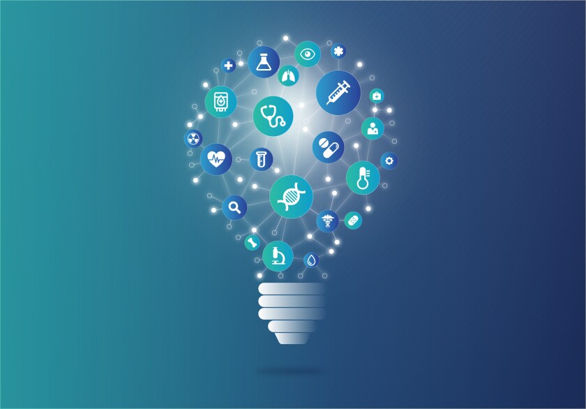 Medical symbols on lightbulb