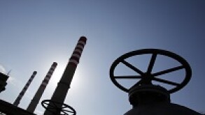 Power plant against the clean blue sky