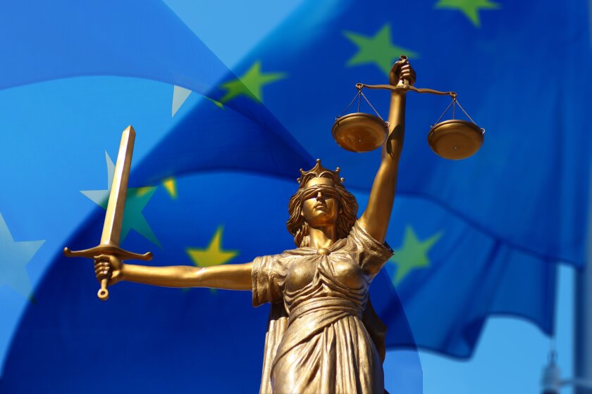 Scales of justice and the EU flag