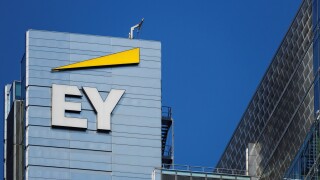 Warsaw/Poland, April 8, 2018: View on EY (formerly Ernst&Young) logo on headquarters