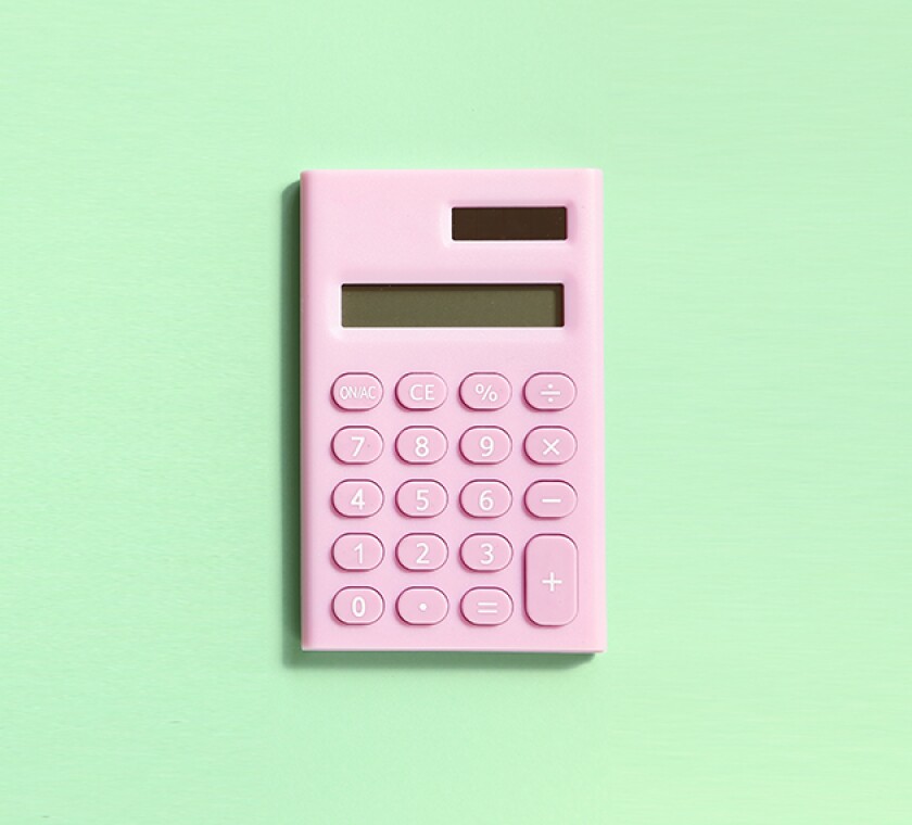 Pink digital calculator on green background