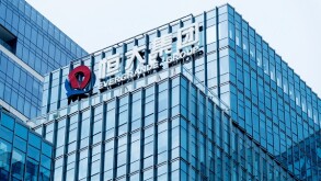 Evergrande logo on office building wall