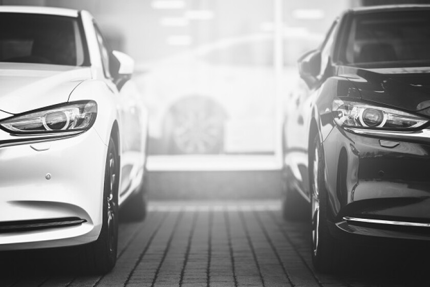 selective between black and white cars