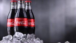 Three bottles of Coca-Cola