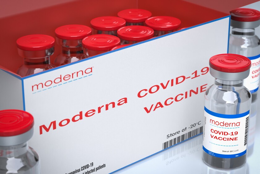 Italy - January, 5, 2021: Moderna Inc produces the vaccine against the COVID-19 virus. Vaccine bottles effective in preventing 95 of Coronavirus Covid-19 infections