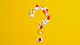 Pills arranged in a question mark.jpg