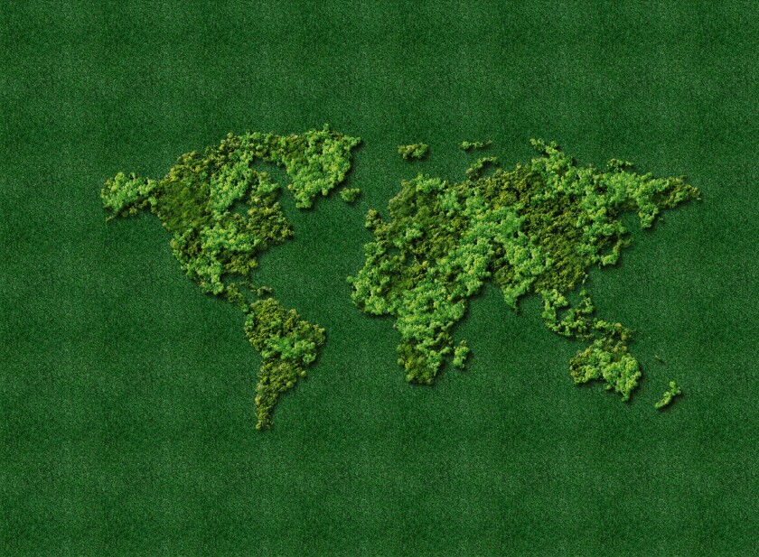 Green World Map-  tree or forest shape of world map isolated on white background. World Map Green- Earth day or environment day Concept. World map made up of various detailed trees on solid white.