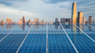 solar energy panel with city twilight