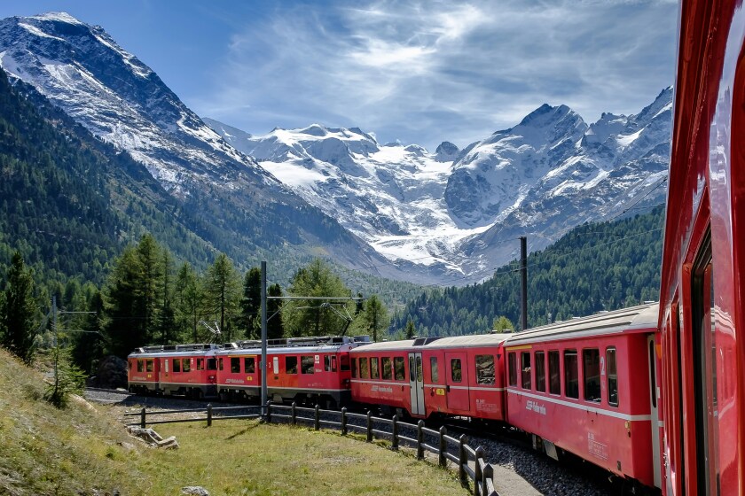 Swiss train in front of the Morteratsch Glacier