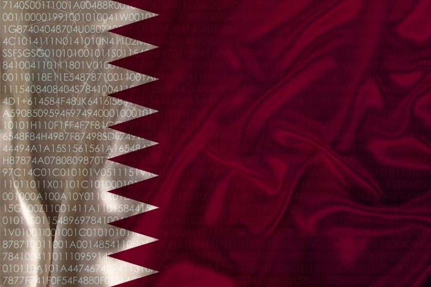 photo of the beautiful colored national flag of the modern state of Qatar on a textured fabric, concept of tourism, emigration, economy and politics, closeup