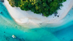 Top view of white sand beach tropical  with seashore as the isla