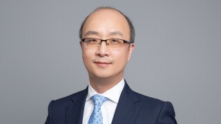 Zhang Jiping headshot.jpg