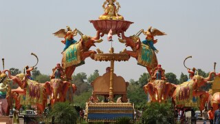 Statue of elephants balancing Hindu god in India