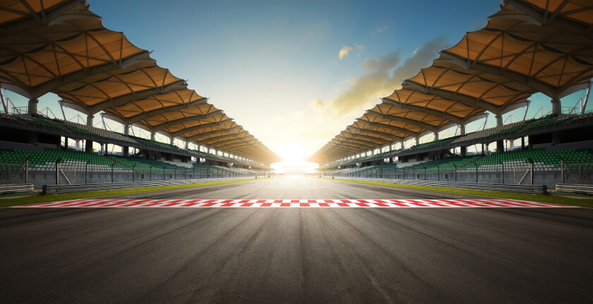 Evening scene asphalt international race track with starting or 