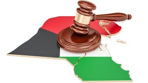 Wooden Gavel on map of Kuwait, 3D rendering