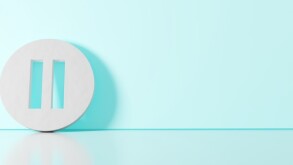 3D rendering of white symbol of pause  icon leaning on color wall with floor reflection with empty space on right side