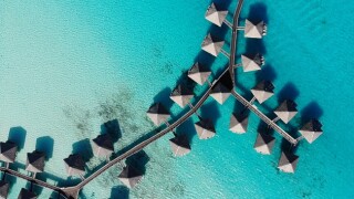 The double tax treaty discussion involves the inclusion of French Polynesia