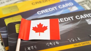 Canada flag on credit card, finance economy trading shopping online business.