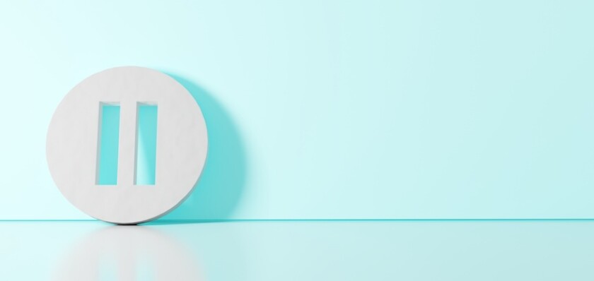3D rendering of white symbol of pause  icon leaning on color wall with floor reflection with empty space on right side