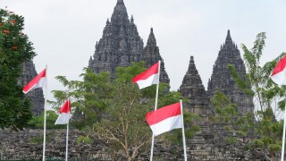 Indonesia flags in front of Prambanan Temple
