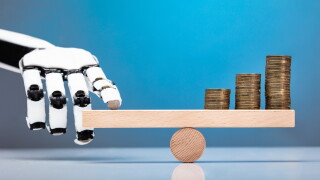 Robot Balancing Stacked Coins With Finger On Seesaw