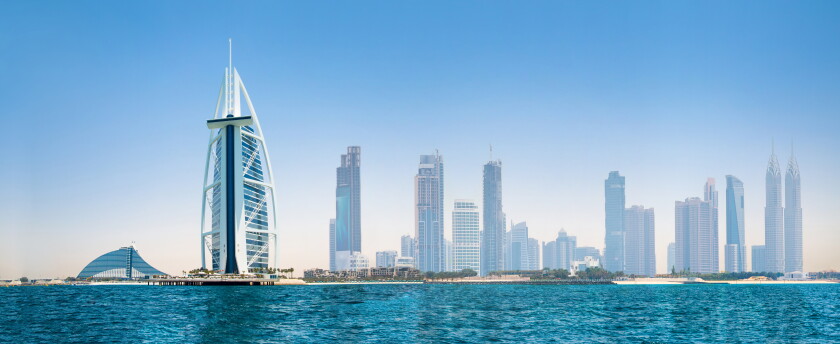 UAE, United Arab Emirates. Dubai and the Persian gulf at sunset.