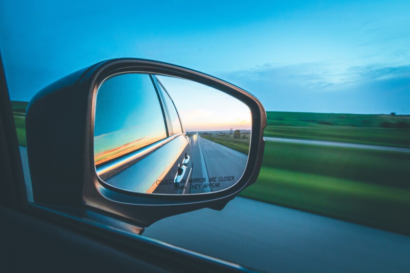 Side mirror of a car looking back