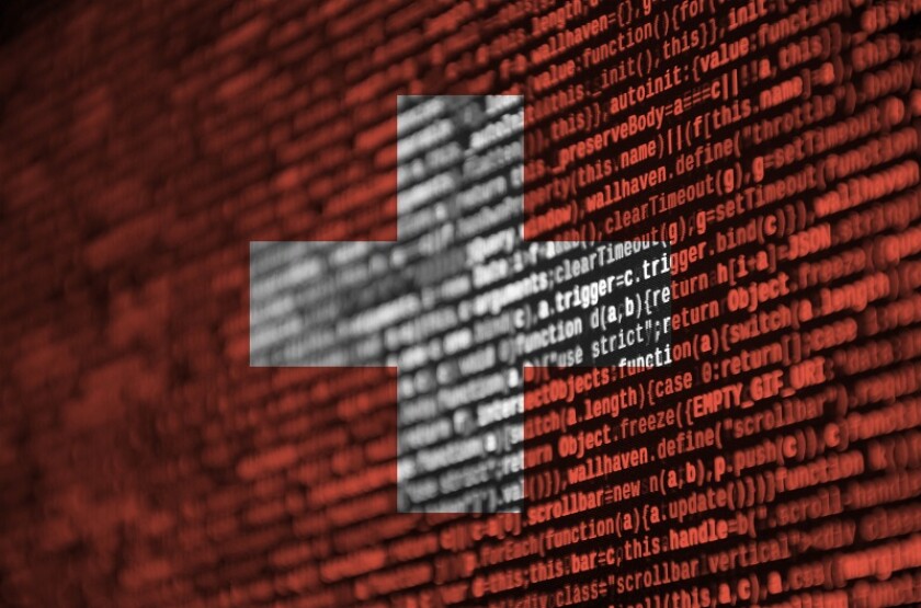 Switzerland flag  is depicted on the screen with the program code. The concept of modern technology and site development