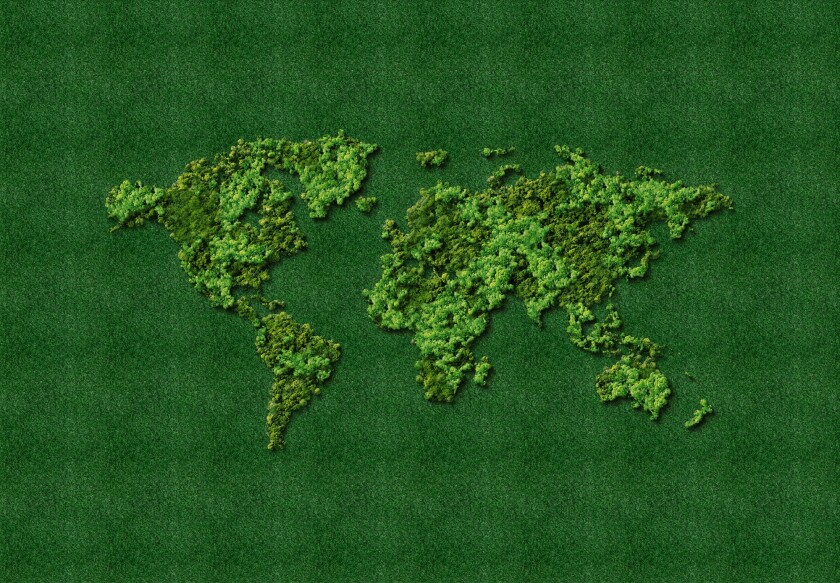 Green World Map-  tree or forest shape of world map isolated on white background. World Map Green- Earth day or environment day Concept. World map made up of various detailed trees on solid white.