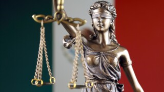 Symbol of law and justice with Mexico Flag. Close up.