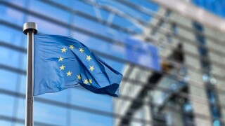 European Union flag against European Parliament