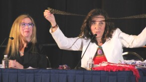 Esther Aburto Olague (right) showing a belt design that had been culturally appropriated 