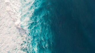 Aerial view to waves in ocean Splashing Waves.